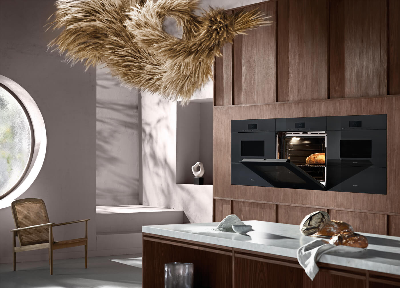 Miele Einbaubackofen grifflos mit Dampfgarer